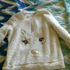A kids 10-14 unicorn sweater